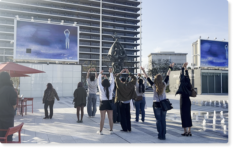 A photo of employees using Breakthru together in the office space