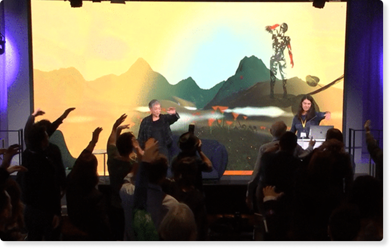 A photo of employees using Breakthru together in the office space