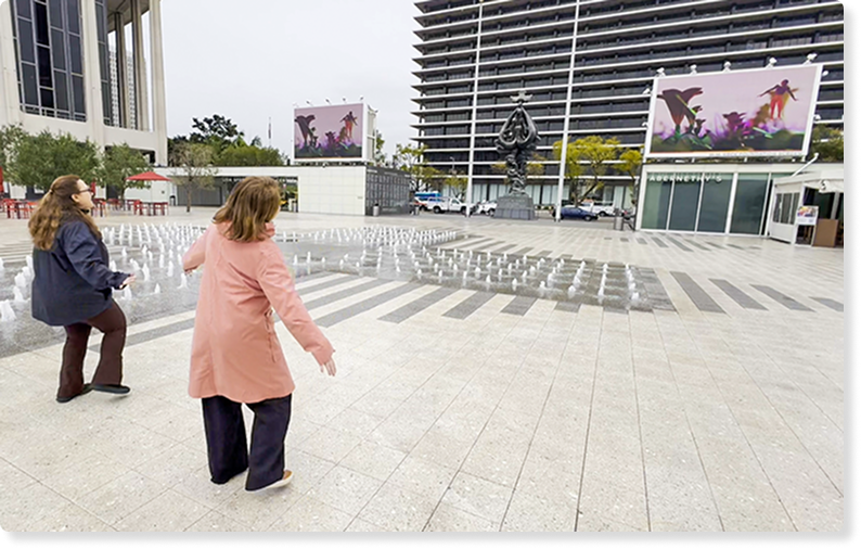A photo of employees using Breakthru together in the office space