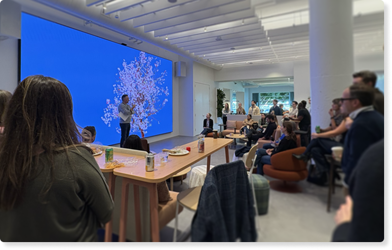 A photo of employees using Breakthru together in the office space