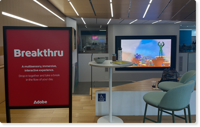 A photo of employees using Breakthru together in the office space